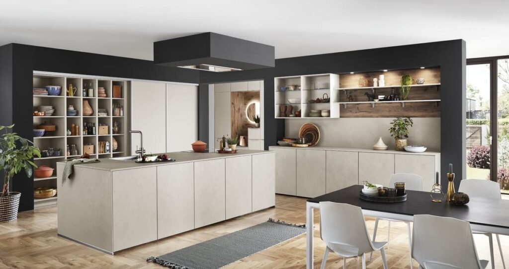 Contemporary kitchen featuring built-in furniture with open shelving and creative storage solutions.