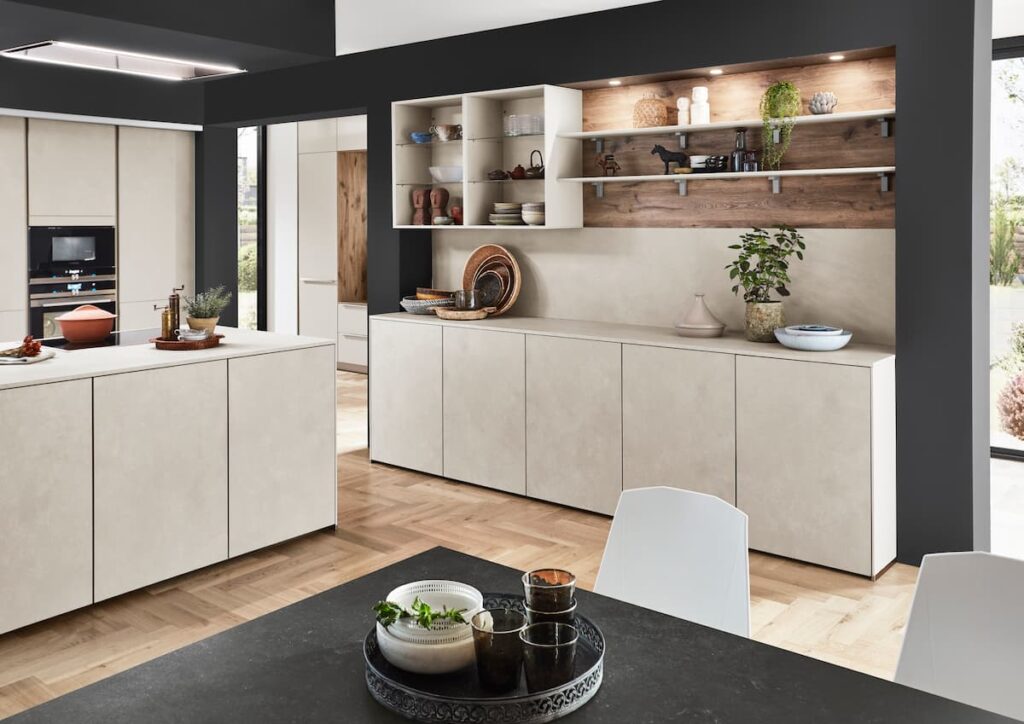 Contemporary kitchen featuring open shelving, beige cabinets, and wood accents, perfect for stylish kitchen interior design ideas.