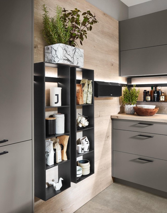 Modern kitchen in Thailand featuring creative storage solutions with sleek shelving, stylish cabinets, and efficient organization for a functional and elegant design.