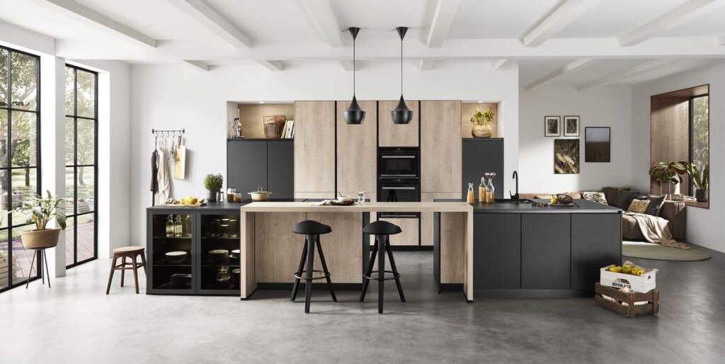 A spacious German kitchen showcasing a combination of wood and matte black finishes.