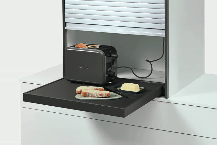 Learn how to hide appliances in a kitchen with a retractable shelf and appliance garage, keeping countertops clutter-free.