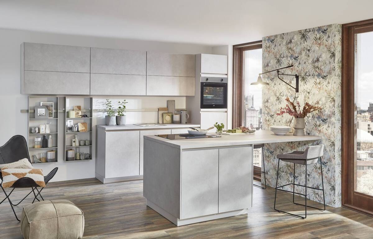 A modern grey kitchen with a floral feature wall. Understanding how to draw a kitchen floor plan helps visualize the placement of cabinets, appliances, and decorative elements.