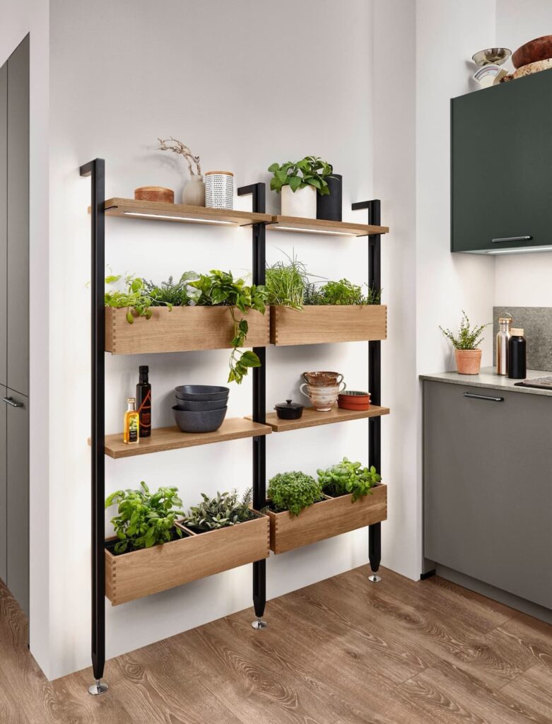 A vertical herb garden adds a touch of green and functionality to this modern kitchen interior design.