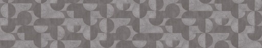 A modern kitchen tile design featuring a geometric grey pattern, adding visual interest and a contemporary touch.