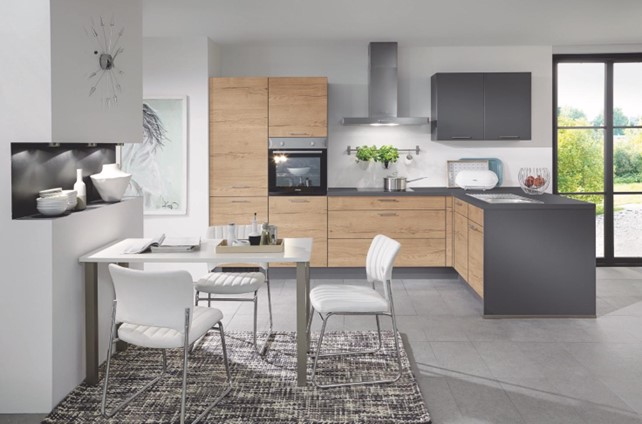 Contemporary L-shaped kitchen interior design with wooden cabinets, black accents, and a stylish dining area, showcasing modern trends and ideas for a functional kitchen layout.