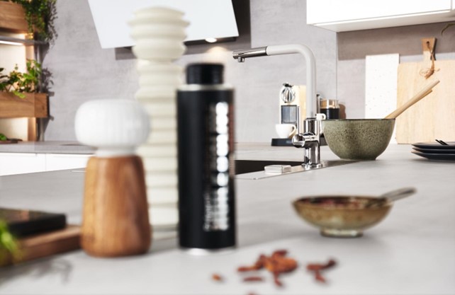 Close-up of modern kitchen top ideas featuring a sleek and durable countertop with stylish kitchen accessories, perfect for a contemporary kitchen design.