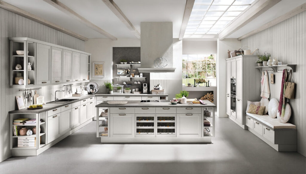 Rustic modern kitchen set with white cabinetry and open shelves, blending traditional and contemporary design.