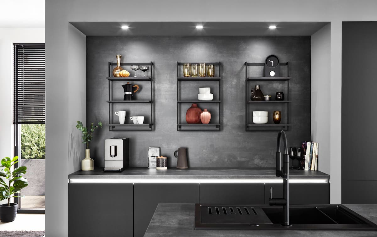 Modern kitchen top ideas with sleek black shelves and minimalist design for organized storage.